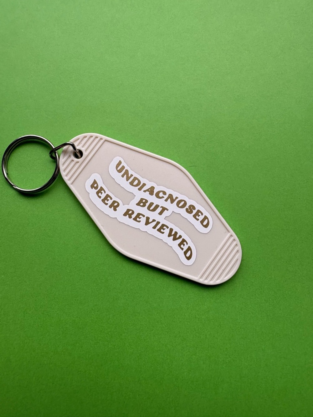 Hand made Cream motel Keychain - "Undiagnosed But Peer Reviewed"